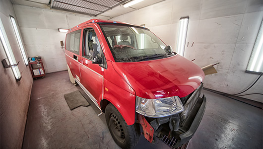 VW transporter in spray booth for accident repair